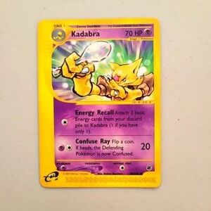 Pokemon Kadabra Trading Card - Yellow and Purple